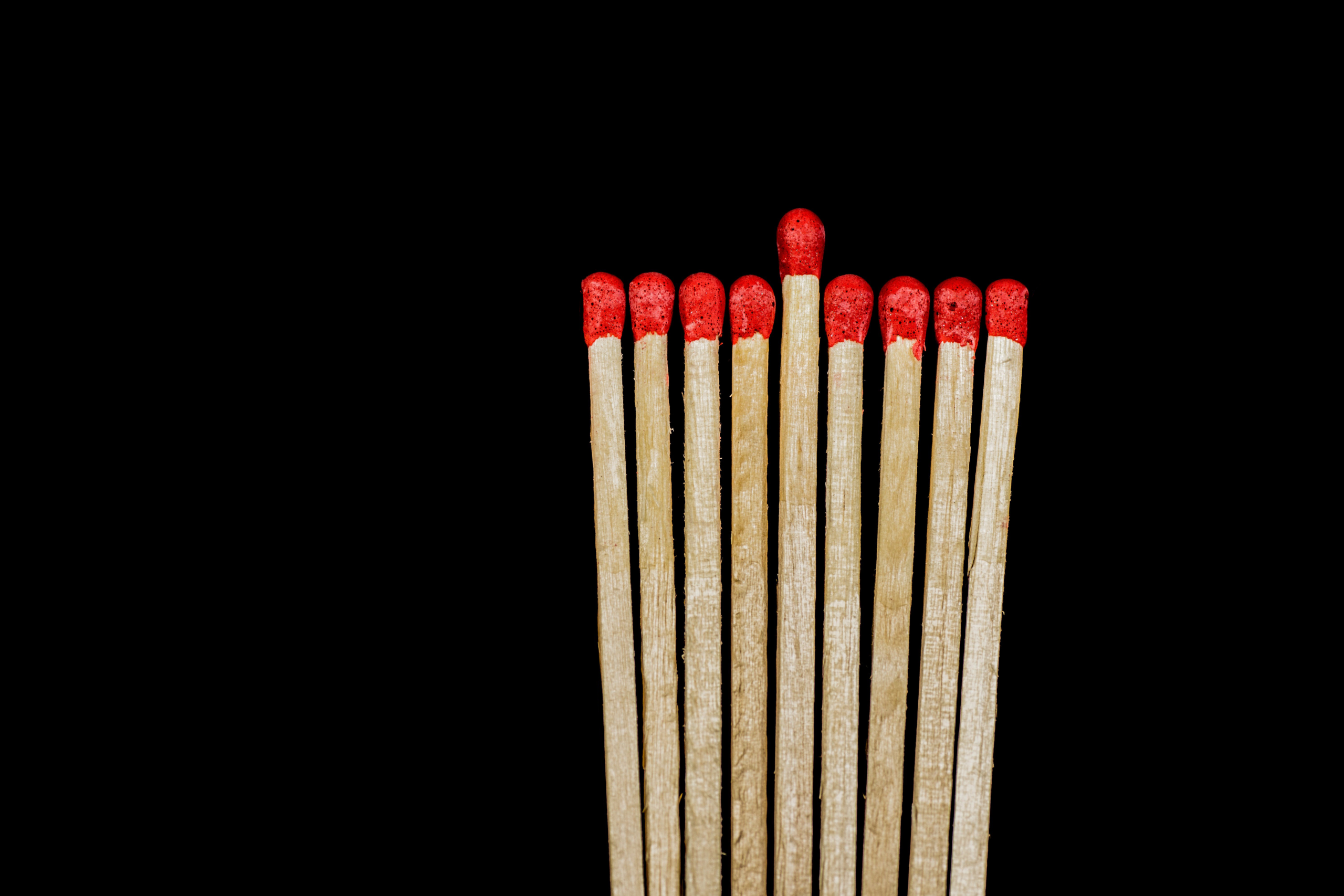 Matches lined up like an unlit menorah