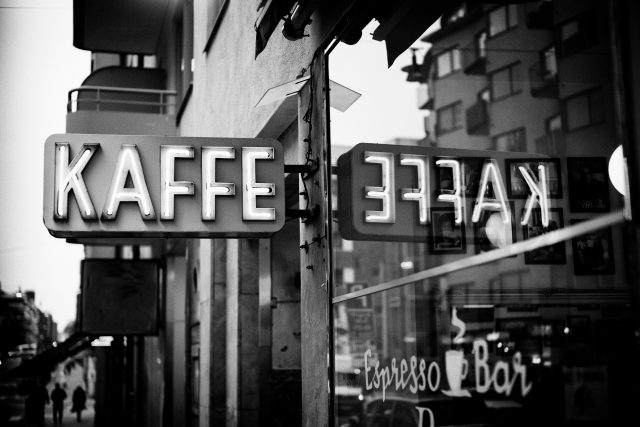 old fashioned kaffe sign in black and white