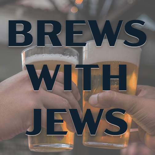 two beer glasses being clinked
