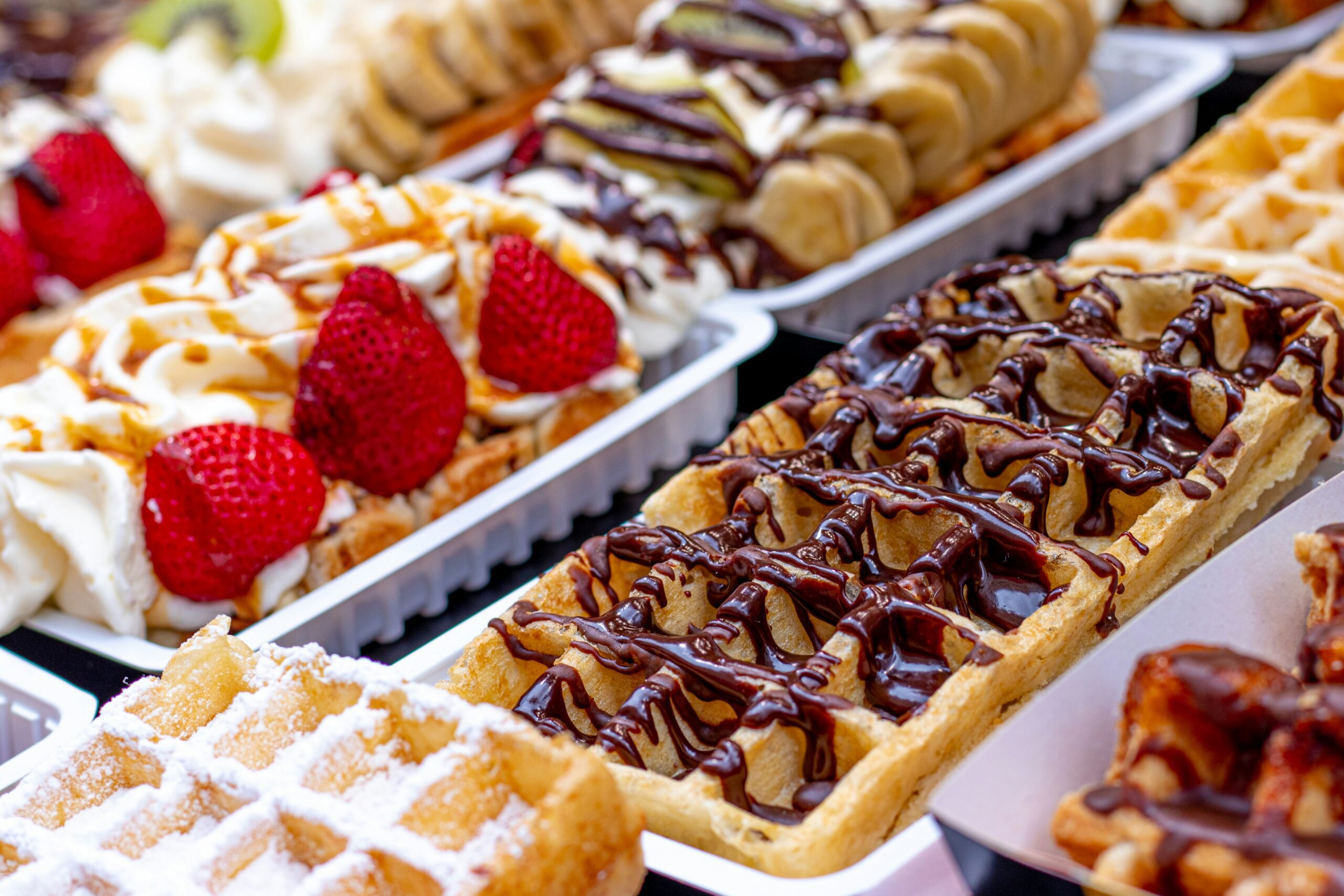 Belgian waffles with a variety of toppings